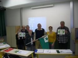 Z zastavo in simbolom esperanta